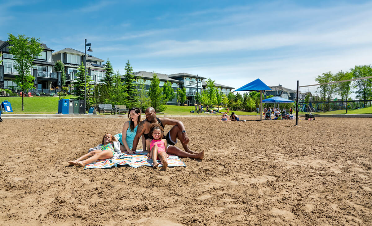 Family sitting together on a beach