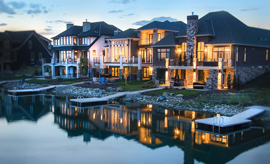 Evening view of Lakefront Estate show homes on Mahogany Lake